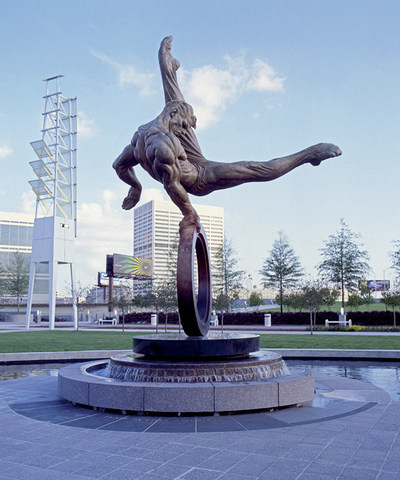 Created for the 1996 Atlanta Olympics, "Flair Across America - The Gymnast" by sculptor Richard MacDonald is a celebration of the triumph of the human spirit - the dedication, tenacity and determination of every individual in the pursuit of excellence.  Flair Across America is a the 26-foot high heroic bronze monument that resides permanently at Georgia International Plaza in Atlanta, Georgia.