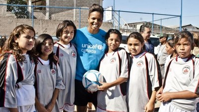 UNICEF Canada Ambassador Karina LeBlanc hosts a soccer clinic for children in Dominica in 2015. (Photo: UNICEF Canada.) (CNW Group/UNICEF Canada)