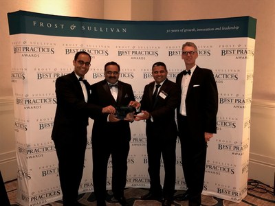 EcoEnergy accepts the prestigious 2017 Global Energy Management Systems Customer Value Leadership Award from Frost & Sullivan. Left to Right: Shawn Menezes, Mansoor Ahmad, and Rajender Beniwal from EcoEnergy; Mead Rusert from Automated Logic.