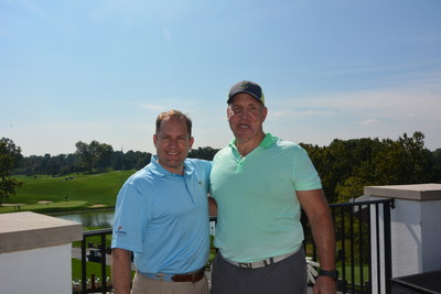 PenFed President and CEO James Schenck (left) with Marine Corps Lt. Col. (ret.) Justin Constantine