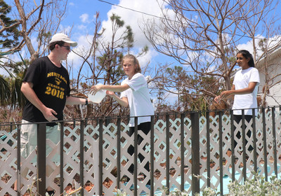 Students from American Heritage School in Plantation and Boca Raton, Florida form an assembly line to unload the much-needed supplies they donated and transported to Big Pine Key Academy, a school in the Florida Keys hit hard by Hurricane Irma.