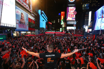 An instructor from Equinox, Cycle for Survival’s founding partner, leads riders at the Times Square Takeover to kick off registration and fundraising for Cycle for Survival’s 2018 events, which are in 16 cities across the country. (Photo Credit: Mike Stobe, Cycle for Survival)