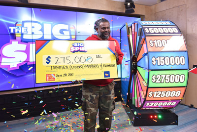 Damitra (Chubbs) Maharaj of Brampton celebrates after spinning THE BIG SPIN Wheel at the OLG Prize Centre in Toronto to win $275,000. Maharaj was the second person to win a top prize with OLG’s new INSTANT game – THE BIG SPIN. (CNW Group/OLG)