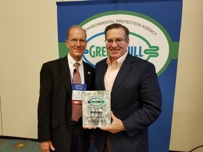 Hillphoenix's Scott Martin (right), director of business development and industry relations receives award from Tom Land, manager of EPA's GreenChill program.