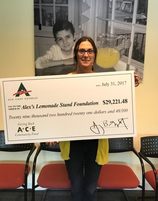Liz Scott, Co-Executive Director of the Foundation and mother of founder Alex Scott accepts ACE's donation