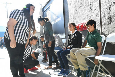 Foot Locker partners with Fred Jordan Missions for the 29th consecutive year donating more than 5,000 shoes to children in need on Skid Row in Los Angeles on Oct. 5, 2017.