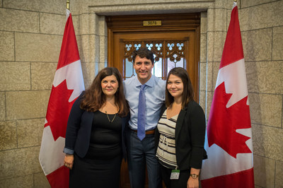 Prime Minister Justin Trudeau celebrates Plan International Canada's #GirlsBelongHere initiative in recognition of International Day of the Girl alongside #GirlsBelongHere participant Breanne Lavallée-Heckert and Plan International Canada President and CEO, Caroline Riseboro. (CNW Group/Plan International Canada)