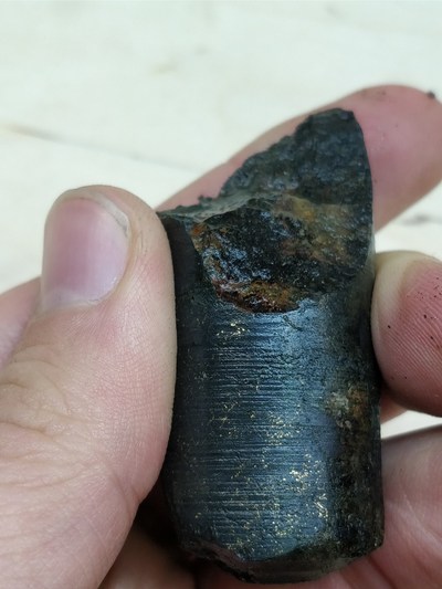Photo 1: Extremely high-grade, visible gold from a mini-drill sample taken from the East Rompas project (minidrill diameter 25mm). No sulphides present in the sample. (CNW Group/Mawson Resources Ltd.)