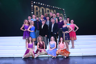 Stephen Schwartz and Daniel C. Levine, pictured center, along with the “Born To Dance” creative team and cast following the New York Premiere on board Regal Princess