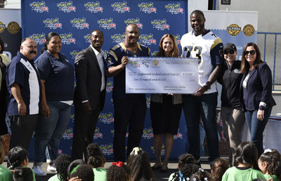 Left to right: Alex Padilla, Dr. Beasley, Johnathan Franklin, Inglewood Mayor James T. Butts Jr., Dr. Melendez, Cornelius Lucas, Jennifer Giambroni, Molly Higgins present a $10,000 Hometown Grant from Real California Milk, representing the state's dairy families, and the Los Angeles Rams to encourage healthy eating and physical activity among students of Inglewood Unified School District.