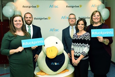 Duckprints Awards honorees, the Greene Family and Aflac agent Susan Svarda, celebrate today's Duckprints event at Dayton Children's Hospital. The Greene family lost their child Emily to cancer. Pictured left to right: Casey Slater, Beau Slater, John Greene, Susan Svarda, Darlene Greene