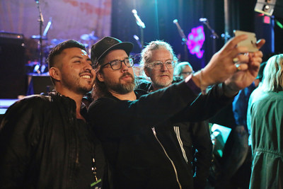 Broken Social Scene superfan Cristhian Camacho captures his ‘Up Close’ moment with band members, Kevin Drew and Brendan Canning. Cristhian won his way into an exclusive concert presented by LOTTO MAX at the Phoenix in Toronto on Saturday. (CNW Group/OLG Winners)