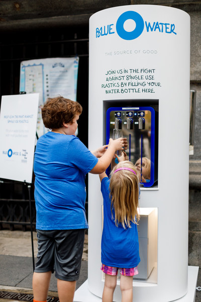 Children filling their reusable bottles at the Bluewater Oasis Hydration Station at the McCormick Bridgehouse and Chicago River Museum plaza. Photo credit: Kathleen Virginia Photography.