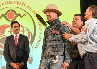 Gord Downie honoured at the December 2016 AFN Special Chiefs Assembly, being presented with the high honour of an eagle feather and given the name Wicapi Omani, Lakota for ?Walks with the Stars?. (CNW Group/Assembly of First Nations)
