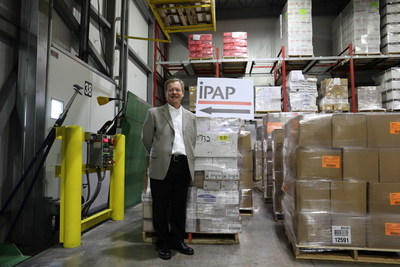 Scott Eithun, President of IPAP with Wisconsin Cheese donation to Irma victims.