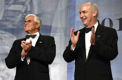 USO CEO and President Dr. JD Crouch II, right, and retired Army Gen. George W. Casey Jr., chairman of the USO Board of Governors, applaud remarks during the 2017 USO Gala on October 19 in Washington, D.C. USO Photo by Mike Theiler