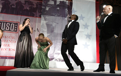 Guests brought up on stage break out in laughter as comedian Jeff Ross, right, makes jokes at their expense as he entertains during the 2017 USO Gala on October 19 in Washington, D.C. USO Photo by Mike Theiler