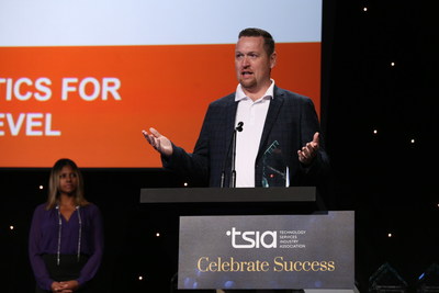 Rob Freeborn, Vice President of Managed Solutions for Optanix, accepts a 2017 TSIA STAR Award for Innovation in Leveraging Analytics for Service Excellence at TSW Las Vegas 2017