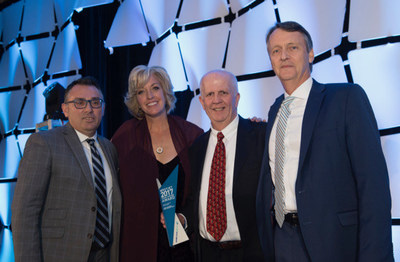 Jane Clementino (Director, Agency Sales) and Lyell Farquharson with the winners of WestJet Top Plus Sales Growth - American Express Global Business Travel (CNW Group/WestJet)