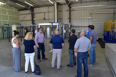 Pick Up Propane Manager Chad Richardson leads a tour for visitors at the new Jurupa Valley Production Center.