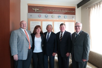 PenFed Foundation Board members dedicate a room within the Defenders Lodge in honor of donor Major General Joseph Lynch, USAF (Ret.). Pictured left to right:  PenFed Foundation Board members Fred Caprio, Sandra (Sam) Patricola, The Honorable Frederick F.Y. Pang (Chairman), MG Lynch and Colonel James Quinn, USA (Ret.).