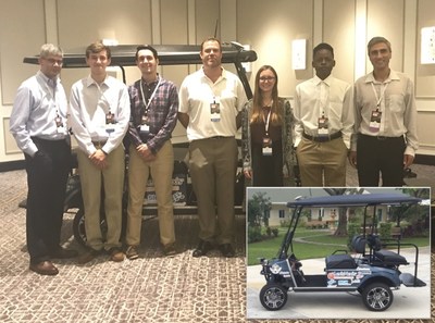 Vijay Raghavan, Executive Vice President & Chief Technology Officer, LexisNexis Risk Solutions and Dr. Flavio Villanustre, Vice President of Technology, LexisNexis Risk Solutions with American Heritage School of Boca Delray pre-engineering robotics students and teacher. Inset photo: The autonomous car created by the students