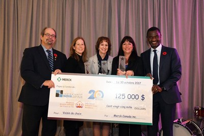 On October 30th, Merck Canada Inc.'s President Chirfi Guindo presented a cheque totalling more than $125,000 for the International Neighbour of Choice award at a "masquerade" celebration held at the company's head office in Kirkland. This year's recipients, The West Island Palliative Care Residence, NOVA West Island and West Island Community Shares, were honoured for the positive impact they have made in the West Island. The Merck International Neighbour of Choice program is designed to support the outstanding work by non-profit organizations whose mission is to improve the quality of life of people and preserve the environment in the communities where Merck operates. From left to right: Mr. Geoffrey Kelley, Member of the National Assembly for Jacques-Cartier, Minister responsible for Native Affairs; Ms. Leanne Bayer, Executive Director, West Island Community Shares; Ms. Teresa Dellar, Executive Director and Co-Founder, West Island Palliative Care Residence; Ms. Marie-France Juneau, Executive Director, NOVA West Island; and Mr. Chirfi Guindo, President and Managing Director, Merck Canada Inc. (CNW Group/Merck Canada Inc.)