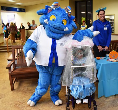 Five-year-old Lucia Ferlita, a patient in St. Joseph’s Children’s Hospital’s Chronic-Complex Clinic, meets Fretta, one of the hospital’s friendly UnMonsters during a special Halloween parade on Tuesday, Oct. 31, 2017.