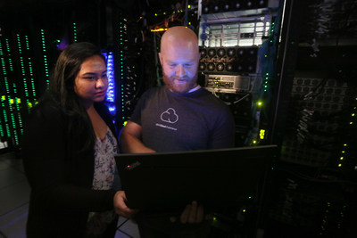 Software engineers Shibani Raikar, left, and Brad Hoover test IBM Cloud Private automation software in the IBM Cloud Innovation Lab in Austin, TX. On Wednesday, November 1, 2017, IBM announced IBM Cloud Private, a new software platform using open source container technology to help unlock billions of dollars in core data and applications built on enterprise software and extend cloud-native tools across public and private clouds. (Credit: Jack Plunkett/Feature Photo Service for IBM)