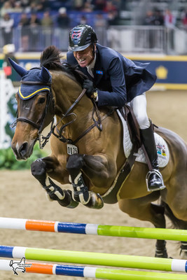 Ian Millar of Perth, ON, riding Dixson is aiming for a record 13th Canadian Show Jumping Championship title after winning the opening round of competition on Friday, November 3, at the Royal Horse Show in Toronto, ON. Photo by Ben Radvanyi Photography (CNW Group/Royal Agricultural Winter Fair)
