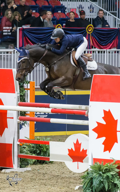 Ali Ramsay of Victoria, BC, placed second in the opening round of the $125,000 Canadian Show Jumping Championship riding Hermelien VD Hooghoeve on Friday, November 3, at the Royal Horse Show. Photo by Ben Radvanyi Photography (CNW Group/Royal Agricultural Winter Fair)