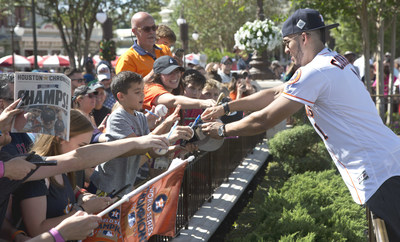 Houston Astros All-Star player Carlos Correa greets fans at Magic Kingdom Park in Lake Buena Vista, Fla., Saturday, Nov. 4, 2017. Correa later joined World Series MVP George Springer and American League batting champion Jose Altuve to lead off a Walt Disney World Parade saluting the team's first world title in its 56-year history. (Gregg Newton, photographer)