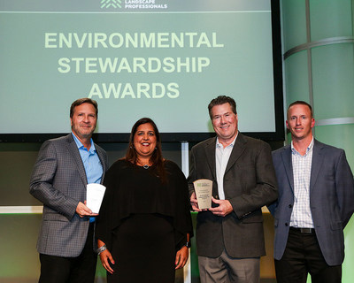 Jeffrey Fedorchak, vice president of corporate affairs at TruGreen pictured with representatives from Environmental Enhancements.