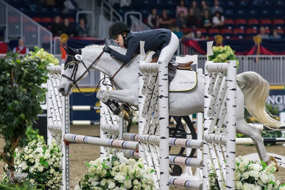 Makayla Clarke of Hilden, NS, riding Twisted tied for the win in the $5,000 MarBill Hill Royal Pony Jumper Final on Sunday, November 5, at the Royal Horse Show in Toronto, ON. Photo by Ben Radvanyi Photography (CNW Group/Royal Agricultural Winter Fair)