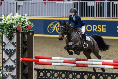 Grace Munro of Wolfville, NS, tied for first in the $5,000 MarBill Hill Royal Pony Jumper Final riding Ever So Clever on Sunday, November 5, at the Royal Horse Show in Toronto, ON. Photo by Ben Radvanyi Photography (CNW Group/Royal Agricultural Winter Fair)