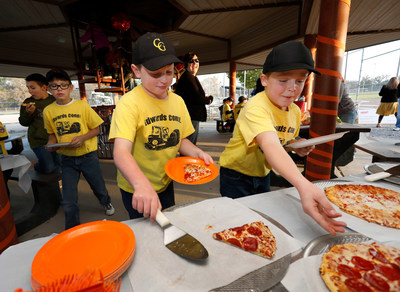 In support of local communities, Tony’s pizza ran a Facebook contest recognizing the importance of community pride. The Council Grove, Kansas 9u Boys Baseball team won the grand prize and were awarded with $10,000 and a pizza party. (Colin Braley, AP Images for Tony’s Pizza)
