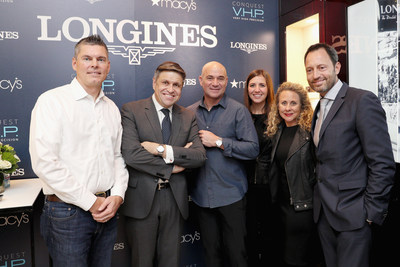 NEW YORK, NY - NOVEMBER 07: (L-R) Justin Macfarlane, Juan-Carlos Capelli, Andre Agassi, Holly Thomas, Rebecca Flegal and Pascal Savoy appear at Macy'?s Herald Square for the U.S. launch of the Conquest V.H.P. on November 7, 2017 in New York City.  (Photo by Rob Kim/Getty Images for Longines)