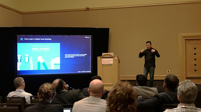 George Zhang, Founder&CEO of iGola, giving a speech at the Phocuswright Conference
