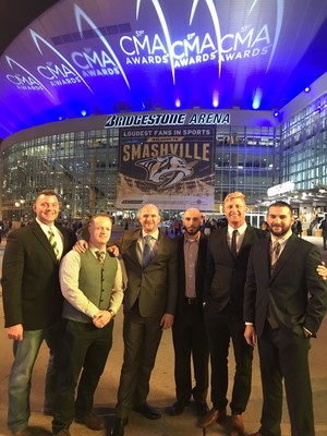 “Meet Me at Clarion” contest winner, Brent Wilson, far left, stands outside the CMA Awards in Nashville with friends. The Clarion hotel brand awarded Wilson, an army veteran, a group getaway to the Country Music Capital for himself and some former fellow platoon members.