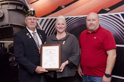 During one of several events TimkenSteel held today to honor its employees who are military veterans, Elaine Russell Reolfi, executive vice president of organizational advancement & corporate relations, accepted the American Legion National Large Employer of Veterans Award from Brad Teis, American Legion first vice district commander (left). Shown on right is William Moore, program delivery manager, Bureau of Workforce Services, whose team nominated TimkenSteel for the award.