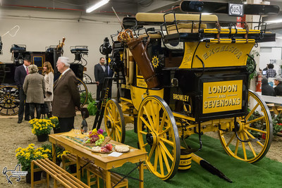 Second place in the Green Meadows Four-In-Hand Coaching Appointments class was presented to John White of Newtown, NJ, and his road coach, Excelsior. Photo by Ben Radvanyi Photography (CNW Group/Royal Agricultural Winter Fair)