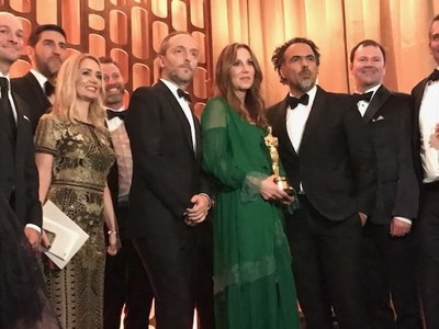 Legendary Entertainment Vice Chairman Mary Parent, director Alejandro G. Iñarritu, and a cinematographer Emanuel Lubezki take a photo at the Annual Governors Awards.