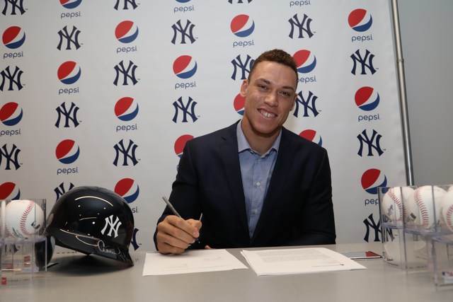 New York Yankees Outfielder Aaron Judge signs his partnership agreement with Pepsi. Judge will serve as the face of Pepsi, championing the spirit and excitement of baseball, both on and off the field.