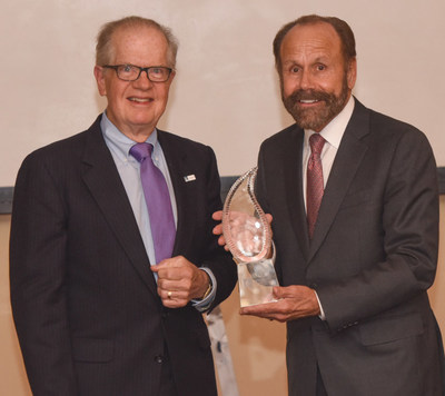 Senator Jerry Hill (right) receiving the 2017 Legislator of the Year Award from the California Massage Therapy Council's Chairman Mr. Mark Dixon (left)