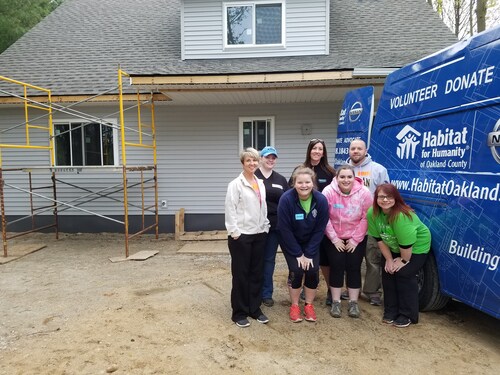 Chase employees working hard during Habitat for Humanity day.