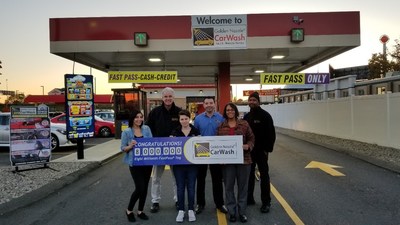 Pictured from left:  Brianna Johnson, Customer Service; Richard Smith, Vice President of Car Wash Operations; Ashley Babcock, 8 millionth FastPass customer; Ryan Roberts, Director of Car Wash Operations; Lisa Starnes, Customer Service Manager; and Alvin Thomas, Golden Nozzle site manager.