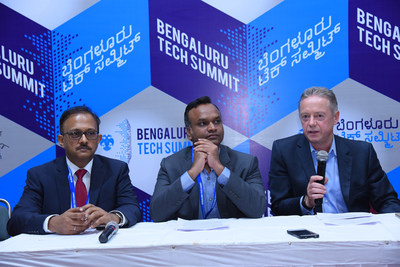 Hon. Minister Priyank Karghe, ITBT & Tourism, Government of Karnataka and Nick Earle, SVP Global Field Operations, Virgin Hyperloop One signing a MoU for a preliminary study in the region