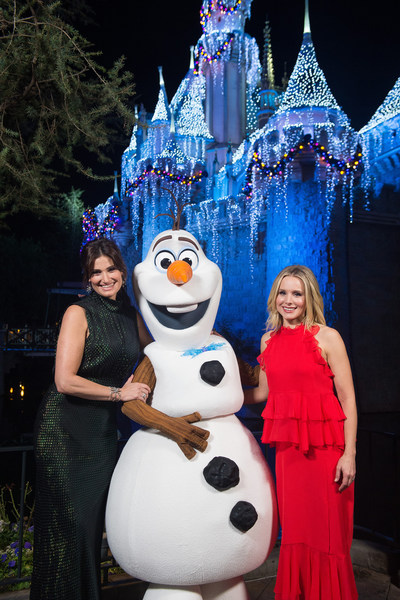 Tony Award-winning actress Idina Menzel (left) and fellow 'Frozen' star Kristen Bell join Olaf just moments before performing on the steps of Sleeping Beauty Castle at Disneyland Park in Anaheim, Calif., Tuesday, Nov. 14, 2017, for a taping of 'The Wonderful World of Disney: Magical Holiday Celebration.' The duo will appear singing together for the first time on primetime television, Thursday, Nov. 30, 9-11p.m. ET, on The ABC Television Network. (Matt Petit, photographer)