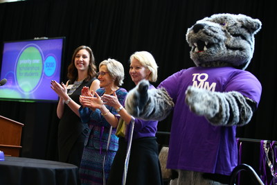 Left to right, Amanda Post, President Julie Sullivan, GHR Foundation head Amy Goldman and Tommie the Tomcat gather on stage to push a button releasing confetti in the Anderson Student Center atrium at the launch of the Student Achievement and Success campaign on November 16, 2017, in St. Paul. The $200 million campaign was kicked off with a $50 million donation by the GHR Foundation.