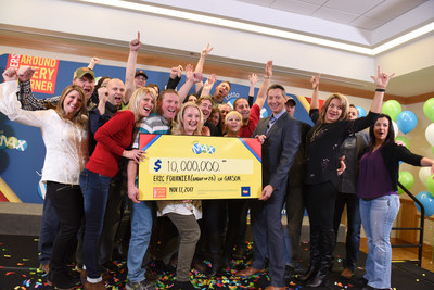 OLG's Executive Director of Marketing and Product Management celebrates a $10 million win with a group of 26 neighbours and best friends from Garson. The group won the October 13, 2017 LOTTO MAX jackpot. (Photo Credit:  Shan Qiao) (CNW Group/OLG Winners)